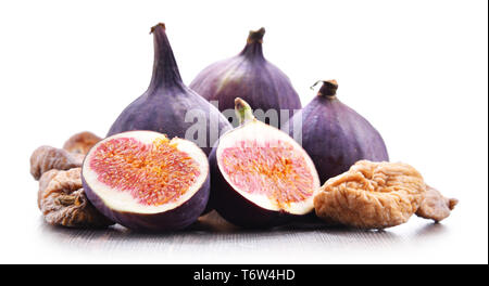 Composition with fresh and dried figs isolated on white. Stock Photo