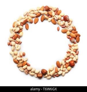 Frame made of different types of nuts on white background Stock Photo