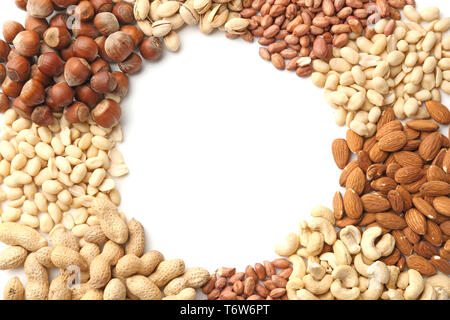 Frame made of different nuts on white background Stock Photo