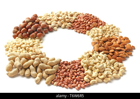 Frame made of different types of nuts on white background Stock Photo