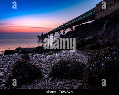 Sunset photo of Clevedon Pier on the River Severn estuary, near to Bristol, Somerset, England, UK. Stock Photo