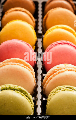colorful French macaroons or macarons in a box Stock Photo