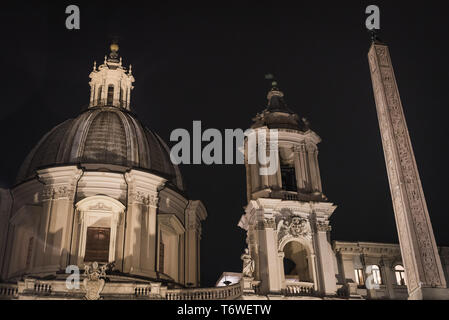 Building and obelix of Piazza Navona by night in Rome Italy