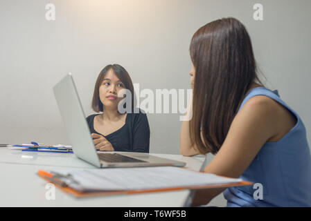 Asian office employees working in the office Stock Photo