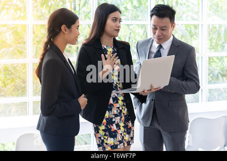 Business people talking at cafe window Stock Photo