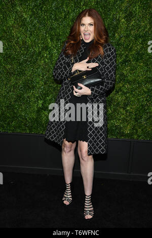 Debra Messing arrives for the 14th Annual Tribeca Film Festival Artists Dinner hosted by Chanel at Balthazar restaurant on April 29, 2019 in New York. Stock Photo