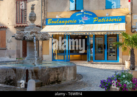 Fountain in courtyad in front of Le Palais d'Or - an Artisan Boulangerie, Valensole, Provence, France Stock Photo