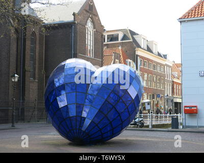 A large street sculpture in the shape of a heart in the Royal Delft blue colour as a tribute to the heritage of pottery production in the town. Stock Photo