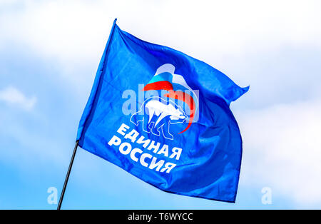 Samara, Russia - May 1, 2019: Flag of the party United Russia against the blue sky Stock Photo