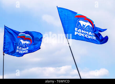 Samara, Russia - May 1, 2019: Flags of the party United Russia against the blue sky Stock Photo