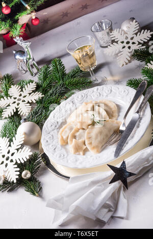 Polish style dumplings filled with sauerkraut and mushrooms Stock Photo