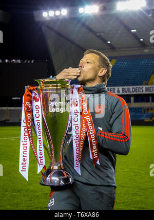 London, UK. 02nd May, 2019. Holger Seitz Head coach of Bayern Munich II celebrates the Trophy win during the Premier League International Cup FINAL match between Bayern Munich II and Dinamo Zagreb II at The Den, London, England on 2 May 2019. Photo by Andy Rowland. Credit: PRiME Media Images/Alamy Live News