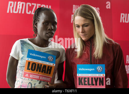 Prague, Czech Republic. 03rd May, 2019. L-R Athletes Lonah Chemtai Salpete (Israel) and Kellyn Taylor (USA) attend a press conference prior to the Volkswagen Prague Marathon 2019, on May 3, 2019, in Prague, Czech Republic. Credit: Katerina Sulova/CTK Photo/Alamy Live News Stock Photo