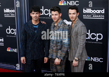 Joe Jonas, Nick Jonas and Kevin Jonas (Jonas Brothers) attending the 2019 Billboard Music Award at MGM Grand Garden Arena on May 1, 2019 in Las Vegas, Nevada. Stock Photo