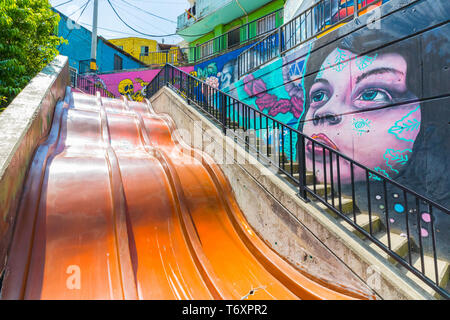 slides for children in the thirteen district in Medellin Stock Photo