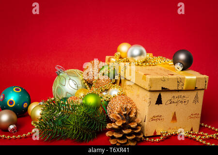 Christmas decoration gift box with red background Stock Photo