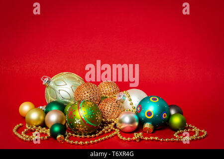 Christmas decoration glass balls on red background Stock Photo