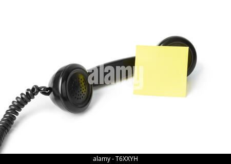 Vintage telephone and blank paper Stock Photo