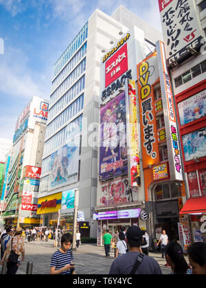 People, anime, stores, shops, and signs in the Akihabara Electric Town district of Tokyo, Japan. Stock Photo