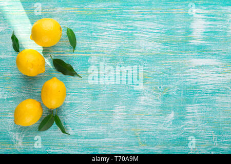 Lemons on wooden table Stock Photo