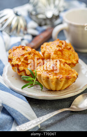 Homemade mini minced meat pies on a plate. Stock Photo