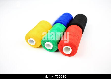 sewing thread in different colors Stock Photo