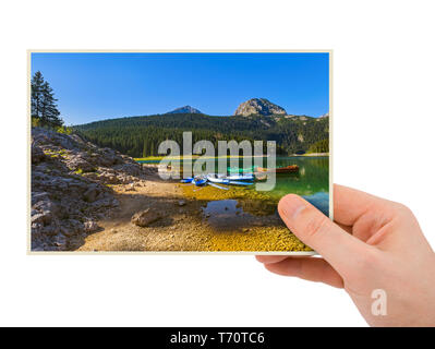Hand and Black Lake image - Montenegro (my photo) Stock Photo