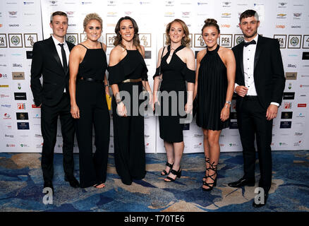 Stephen Darby (left), Manchester City's Steph Houghton, Lyon's Lucy Bronze (third left), Manchester City's Jennifer Beattie, and Georgia Stanway (second right) during the 2019 PFA Awards at the Grosvenor House Hotel, London. Stock Photo