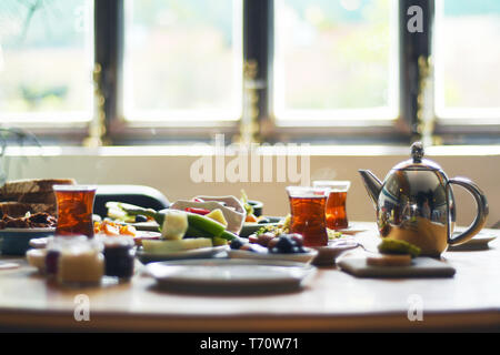 Turkish breakfast with various plates on a table Stock Photo