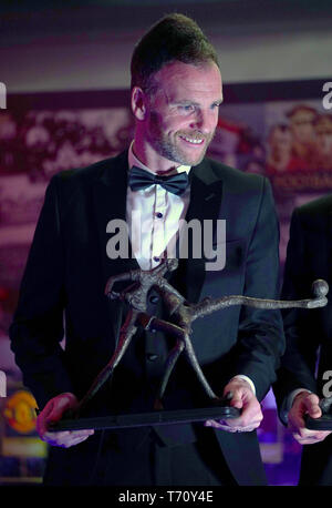 Bury goalkeeper Joe Murphy poses with his PFA League Two Team of the Year award during the 2019 PFA Awards at the Grosvenor House Hotel, London. Stock Photo