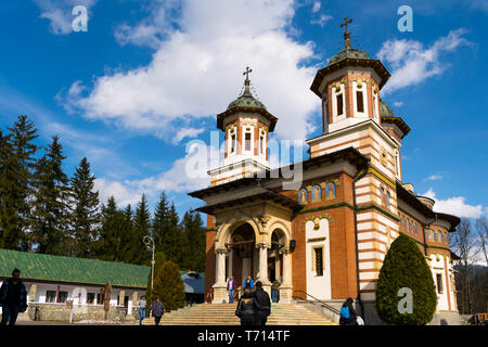 Sinaia, Romania - March 09, 2019: People visiting Sinaia Monastery located in Sinaia, Prahova county, Romania. Stock Photo