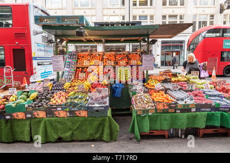 Fruit stall, Goodge Street underground station London UK Stock Photo