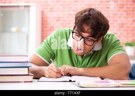 Young student preparing for exams at home Stock Photo