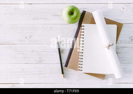 School books on wooden table, education concept Stock Photo