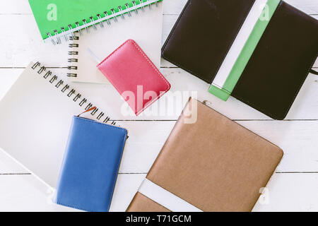 Books on wooden background Stock Photo