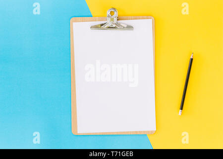 Wooden clipboard on table Stock Photo