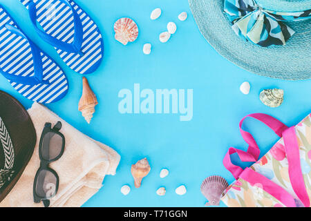 Beach accessories on blue background Stock Photo