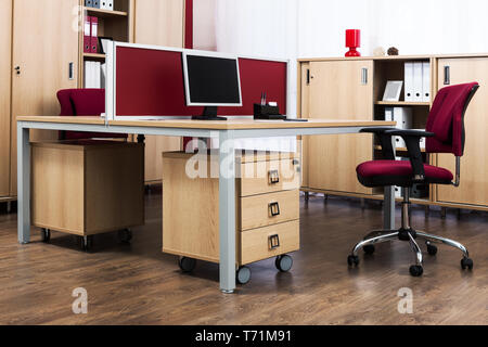 table with computer in modern office Stock Photo