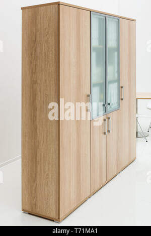 bookcase on the background of white walls Stock Photo