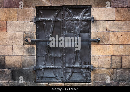 window closed with iron shutters Stock Photo