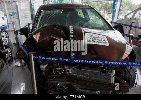 Proton damaged car for show inside the main company. Stock Photo