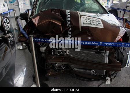 Proton damaged car for show inside the main company. Stock Photo