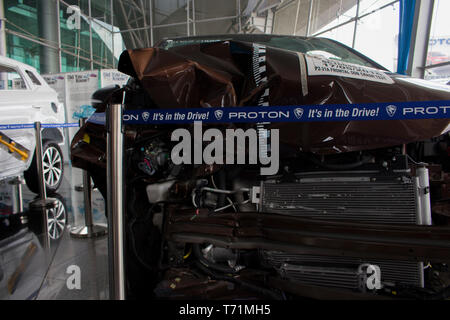 Proton damaged car for show inside the main company. Stock Photo