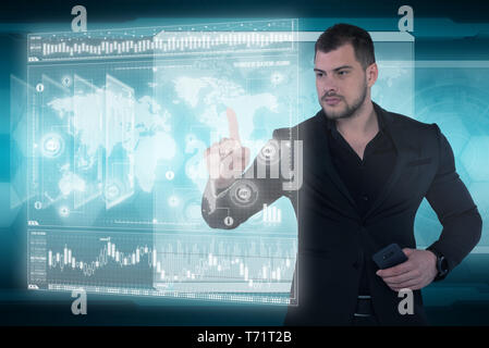 Businessman works with virtual holographic interface. Future technology concept Stock Photo