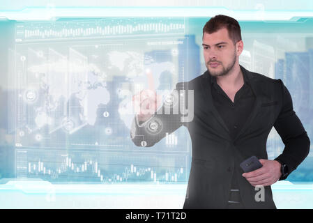 Businessman works with virtual holographic interface. Future technology concept Stock Photo