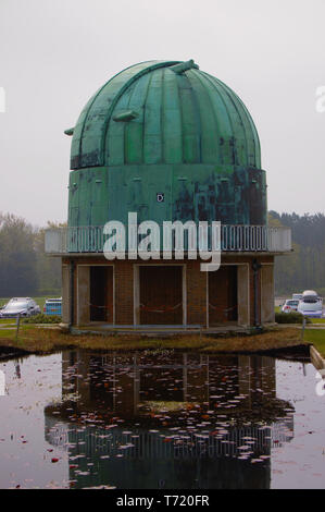 This Observatory was built in South England in the 50's. It has a copper dome covering the telescope. Stock Photo