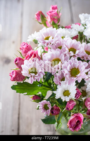 Flowers chrysanthemums and roses Stock Photo