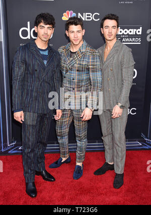 LAS VEGAS, NV - MAY 01: (L-R) Joe Jonas, Nick Jonas, and Kevin Jonas of the Jonas Brothers attend the 2019 Billboard Music Awards at MGM Grand Garden Arena on May 1, 2019 in Las Vegas, Nevada. Stock Photo