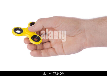 Spinner in hand Stock Photo