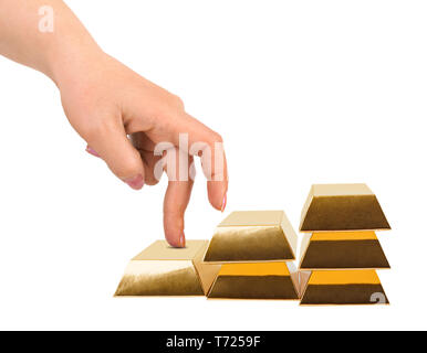 Hand and stairs made of gold bars Stock Photo